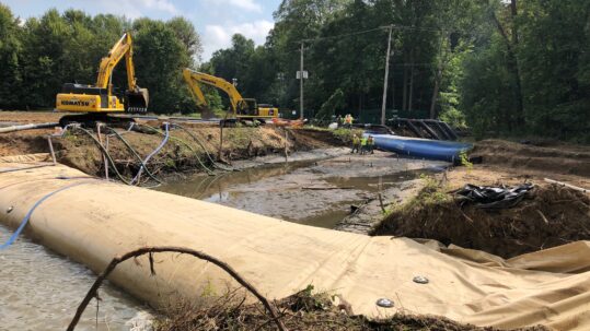 Temporary cofferdams for pipeline construction